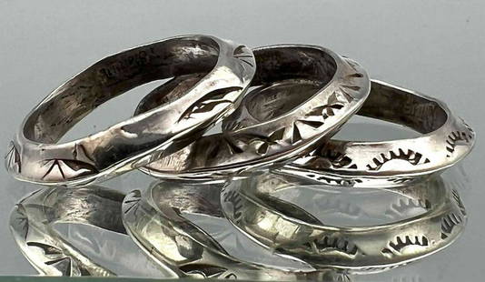 Three Navajo Sterling Silver Hand Stamped Bands: Three Navajo Sterling Silver Hand Stamped Bands. Marked Sterling. 12.8g. Size 8.5.