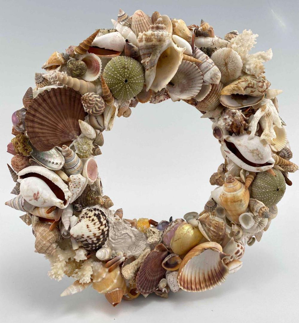 Vintage Seashell Wreath: Vintage Seashell Wreath. Marked Dottie S, Xmax 75, Aptos, Cal. Approximately 16.25H x 15.75W x 2.75D in.
