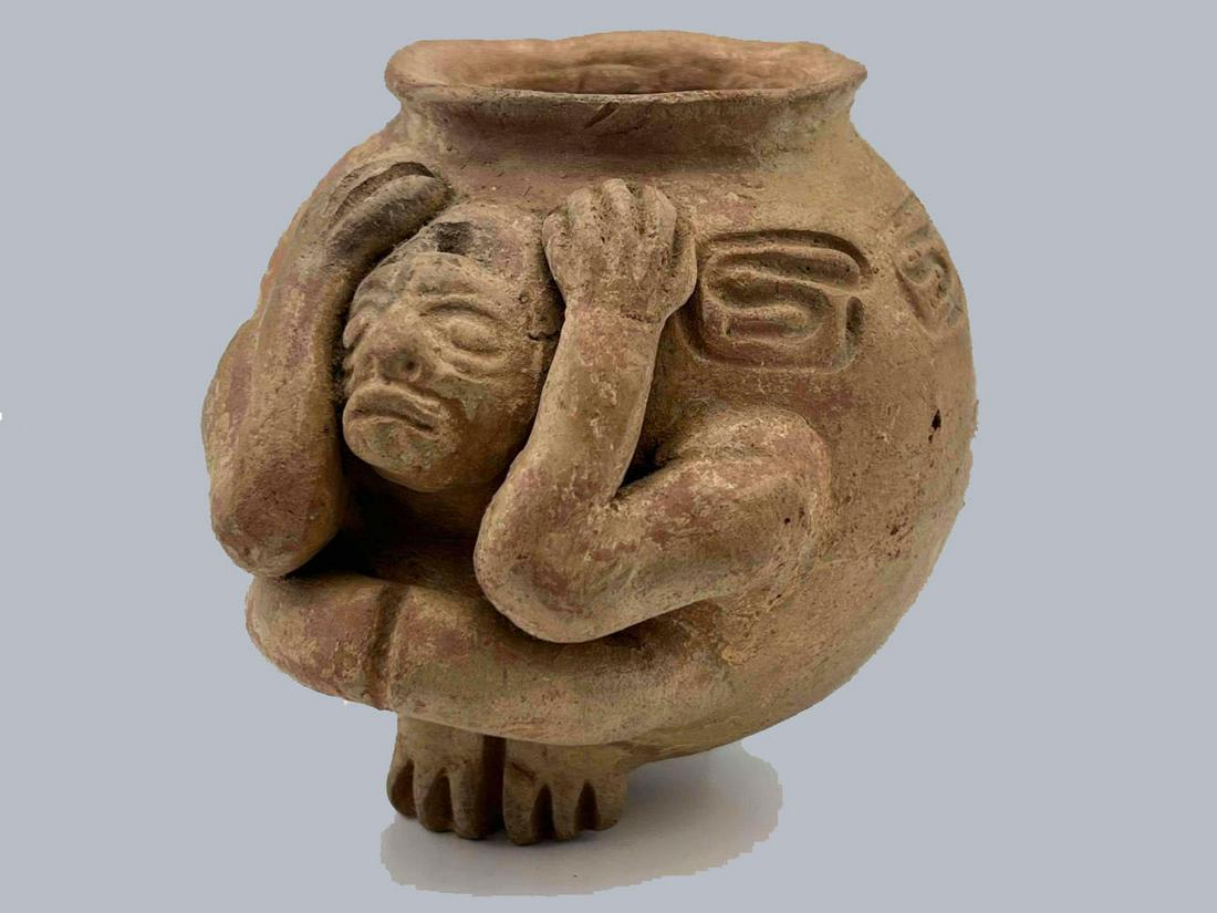 Pre-Columbian Style Central American Terra Cotta Pot: Pre-Columbian Style Central American Terra Cotta Pot With Expressive Crouching Figure And Stamped Details. Approximately 4.4375H x 4.8125W x 5.875D in.