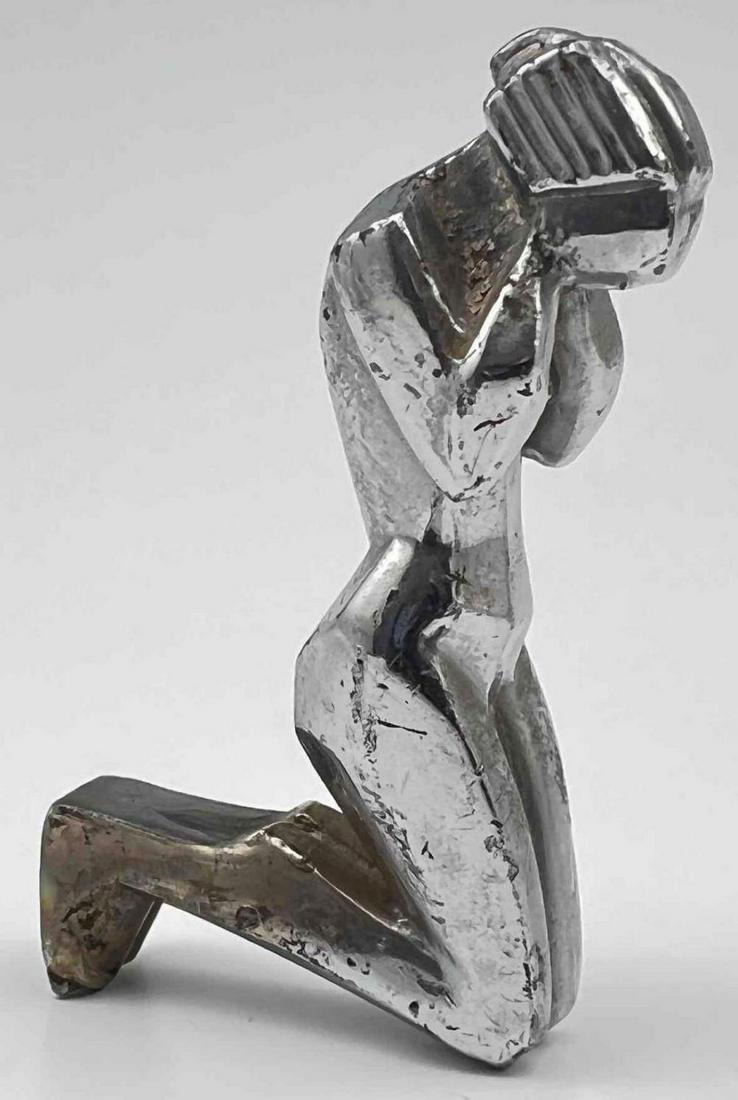 German Expressionist School Miniature Sculpture of a Crying Woman, Unsigned: German Expressionist School Art Deco Miniature Sculpture of a Crying Nude Woman, Unsigned. Approximately 3 L x 0.8125 W x 1.5 H Inches.
