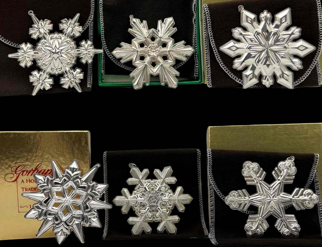 6 Sterling Silver Gorham Christmas Snowflake Ornaments: 6 Sterling Silver Gorham Christmas Snowflake Ornaments. 123.9g. Marked Sterling, Gorham. Largest Item Approximately 3.625 L x 3.25 W Inches.