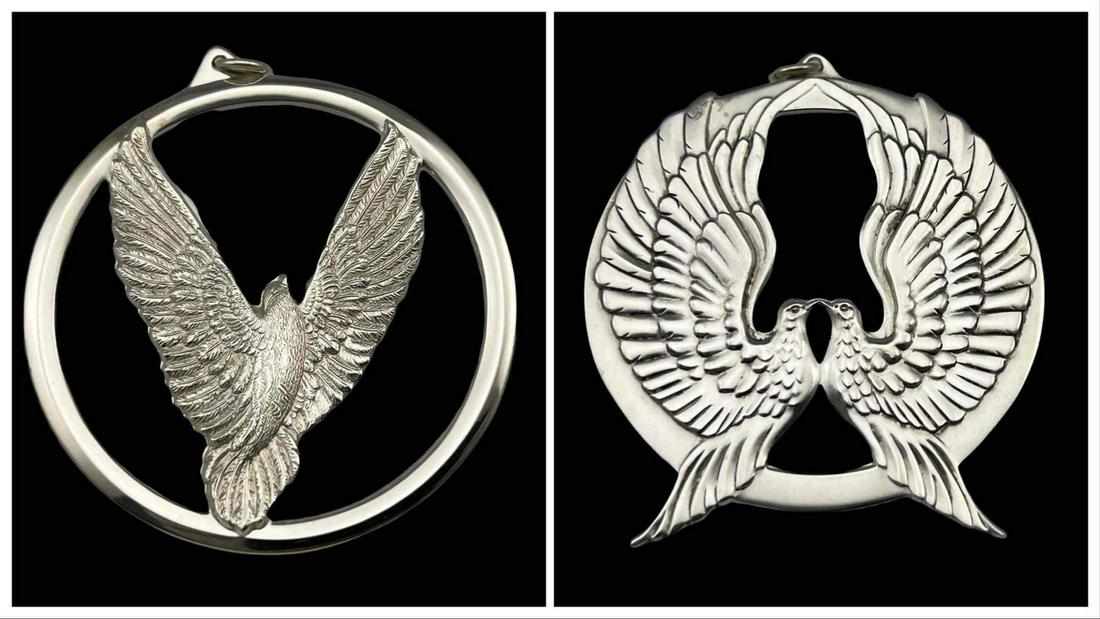 2 Wallace Sterling Silver Dove Medallions: 2 Wallace Sterling Silver Dove Medallions. 62.0g. Marked Sterling, Wallace. 1973 Peace On Earth Good Will Toward Men And 1975 Peace On Earth Good Will Toward Men. 1973 Pendant Approximately 2.55 L x 2