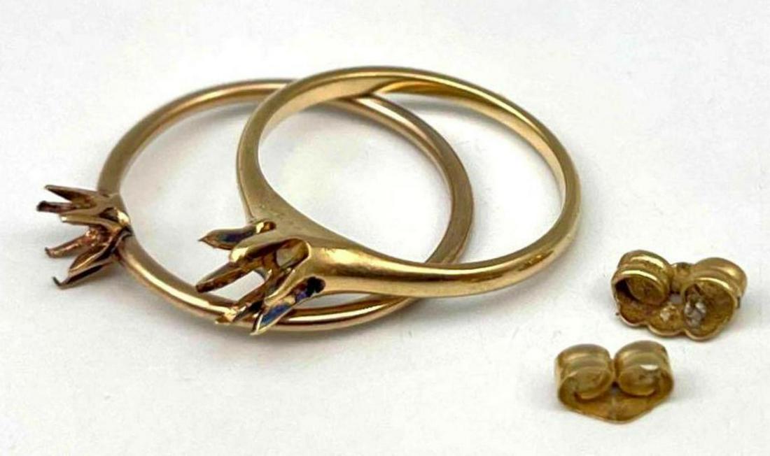 Scrap Gold Lot: 14K And 10K Scrap Gold Lot. 14K 1.6g. 10K 0.9g. One Ring And Both Earring Backings Marked 14K. One Ring Unmarked, Tests As 10K. ALL CREDIT CARDS WILL BE MANUALLY VERIFIED PRIOR TO SHIPMENT.