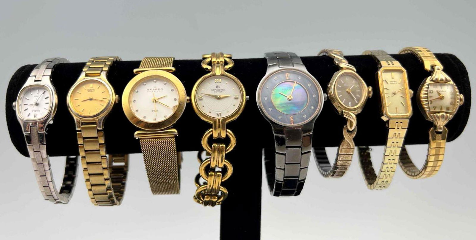 Eight Watches Including Raymond Weil, Bulova, Seiko, Skagen, And Pulsar: Eight Watches Including Raymond Weil, Bulova, Seiko, Skagen, And Pulsar, One In Box. Largest Band Approximately 7.25L x 0.5W in., Face Approximately 0.875W in. Smallest Band Approximately 6.75L x 0.25