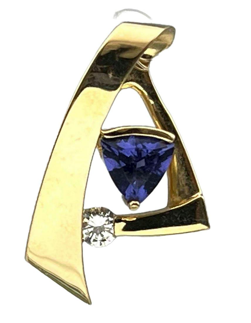 14K Gold Modernist Zircon Pendant: 14K Gold Modernist Zircon Pendant. 3.6g. Marked 14K. 1.125 L x 0.75 W x 0.25 D Inches. ALL CREDIT CARDS WILL BE MANUALLY VERIFIED PRIOR TO SHIPMENT.