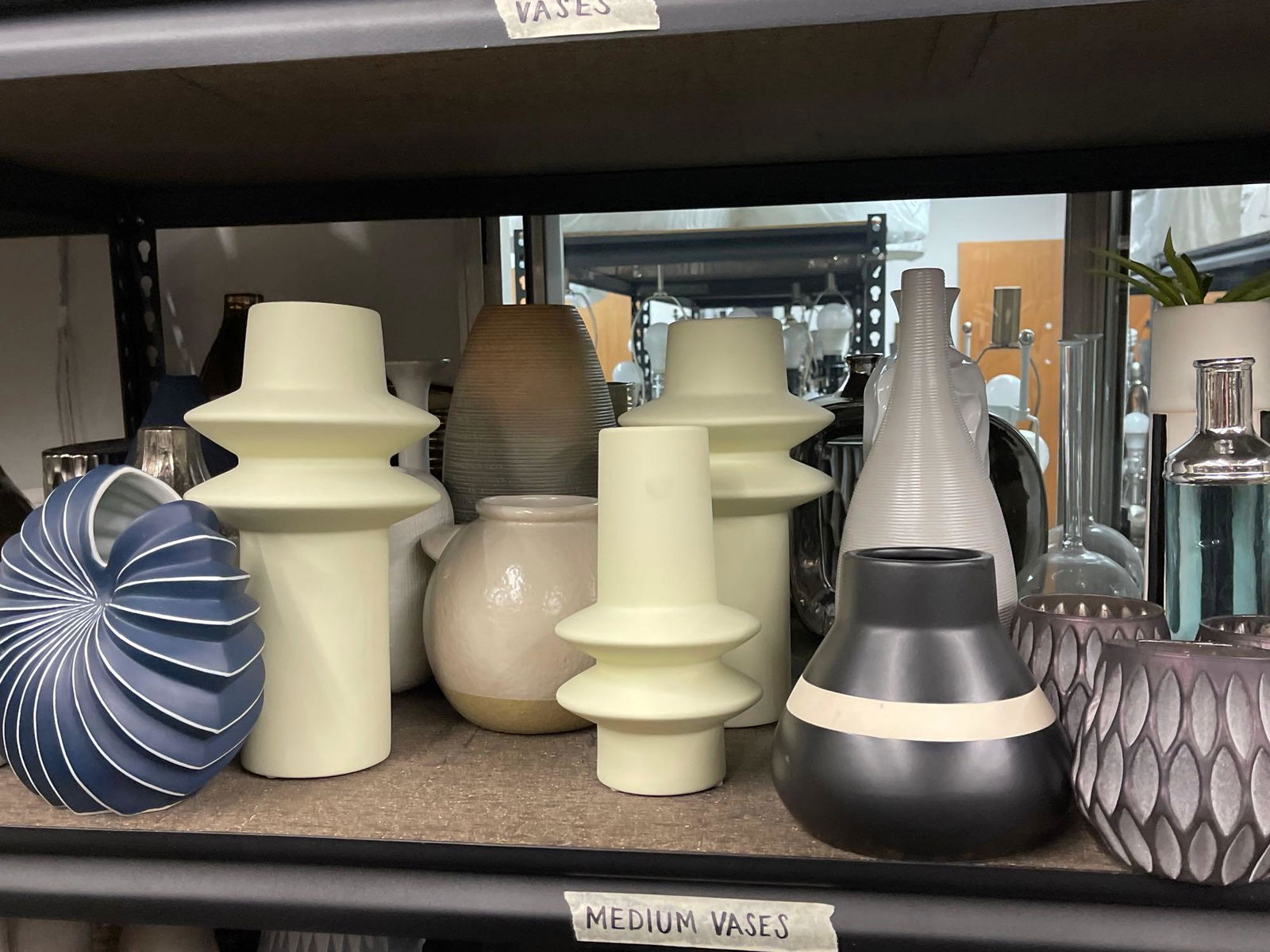 Shelf of vases, mostly ceramic (1 of 5)