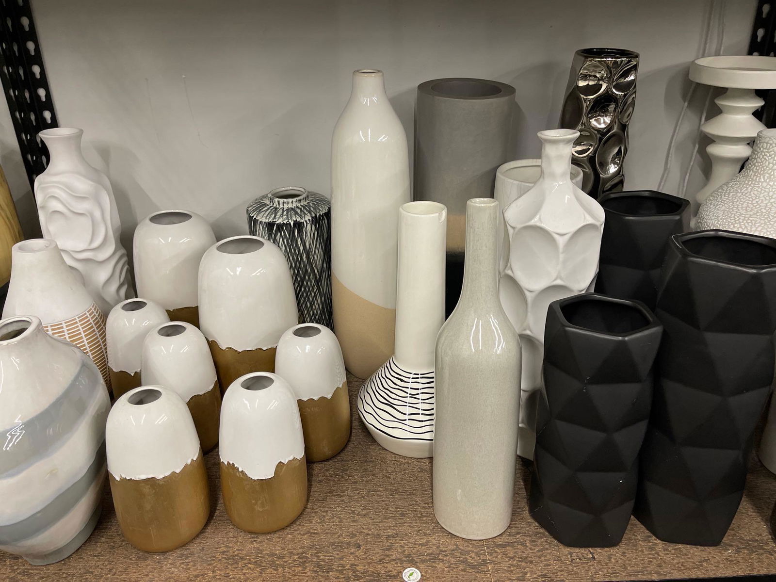 Shelf of medium and tall vases, mostly ceramic (1 of 5)