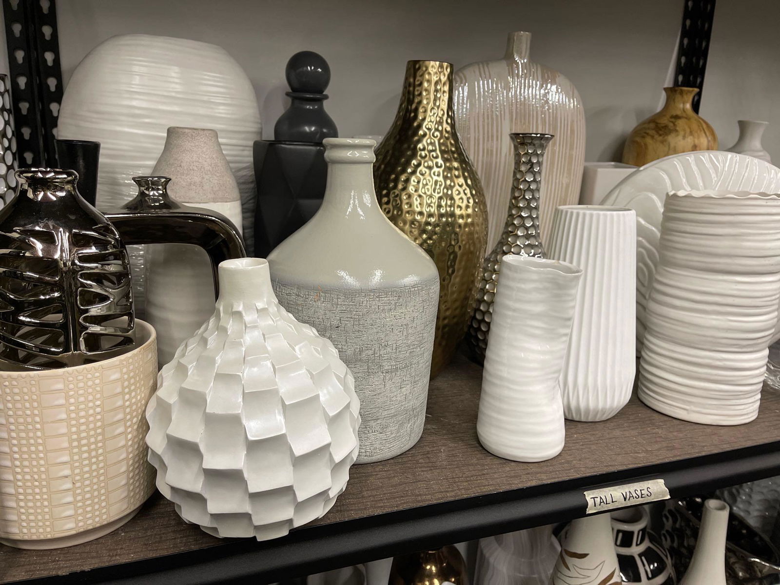 Shelf of tall and medium vases, mostly ceramic (1 of 7)