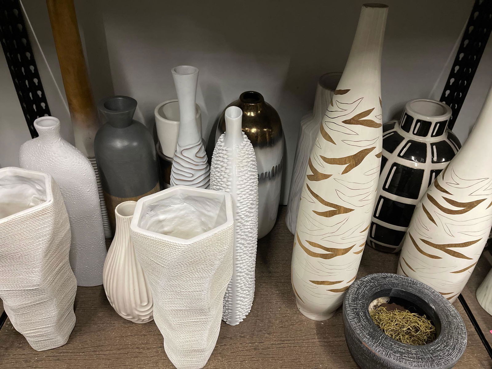 Bottom shelf of large vases, ceramic and composite (1 of 5)