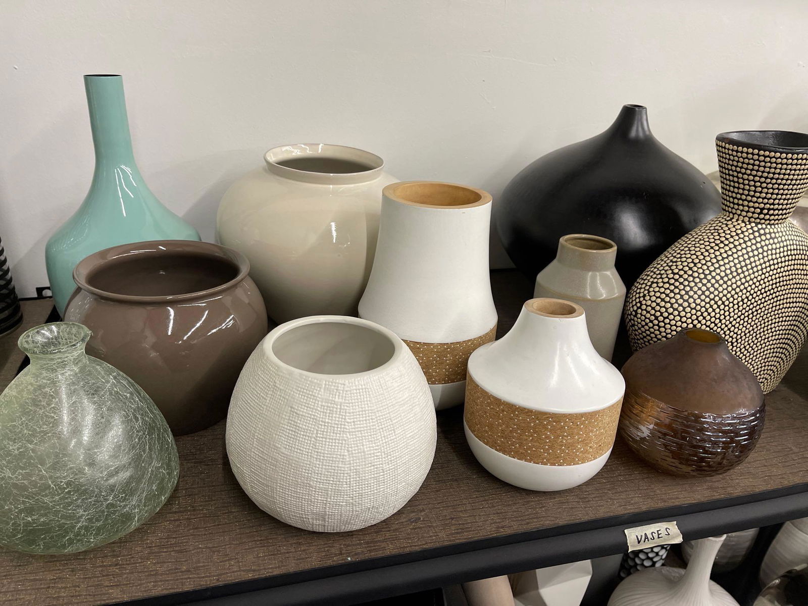 Top shelf of medium vases, ceramic wood and composite (1 of 5)