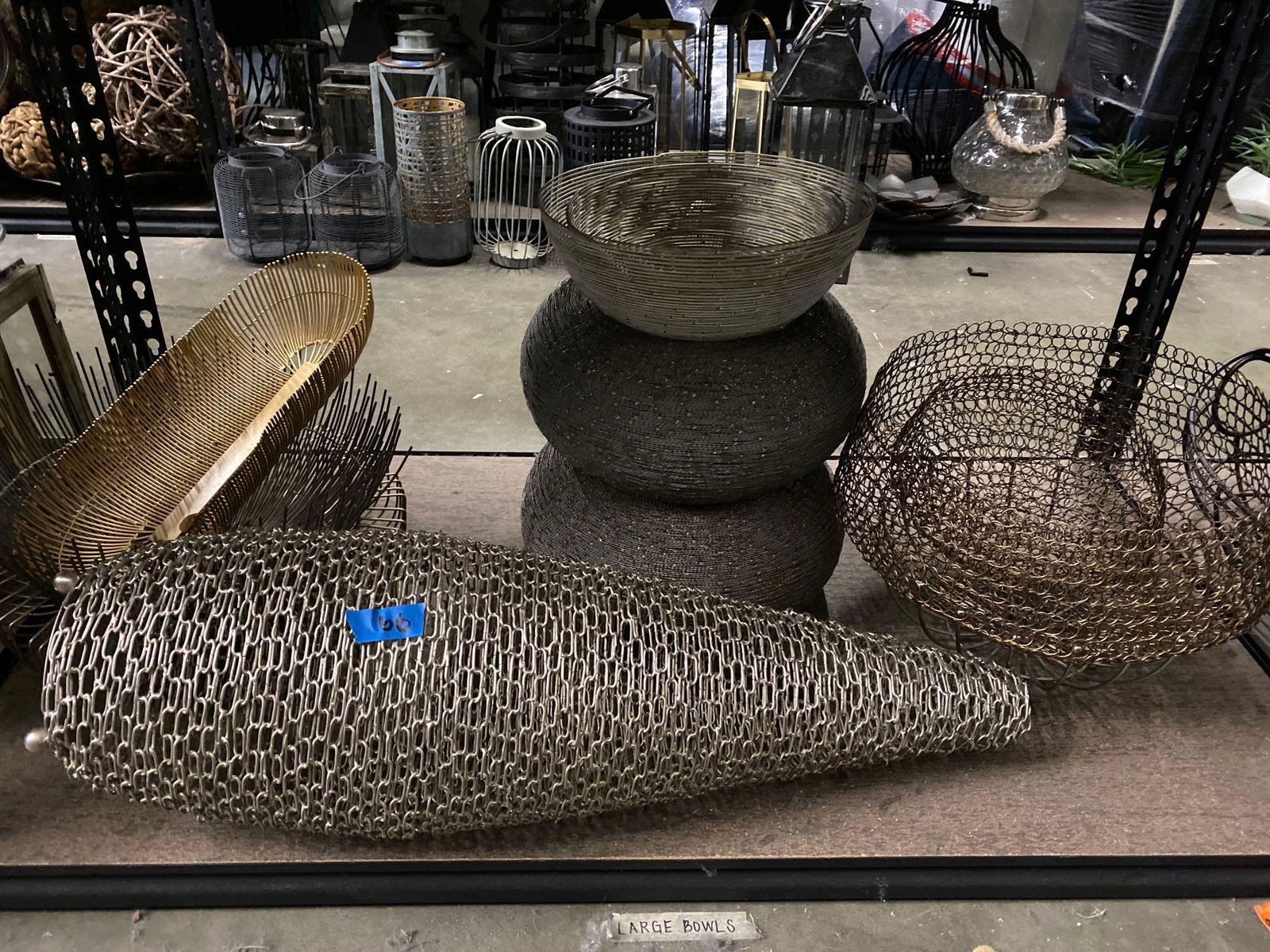 Bottom shelf modern metal baskets, decorative items (1 of 3)