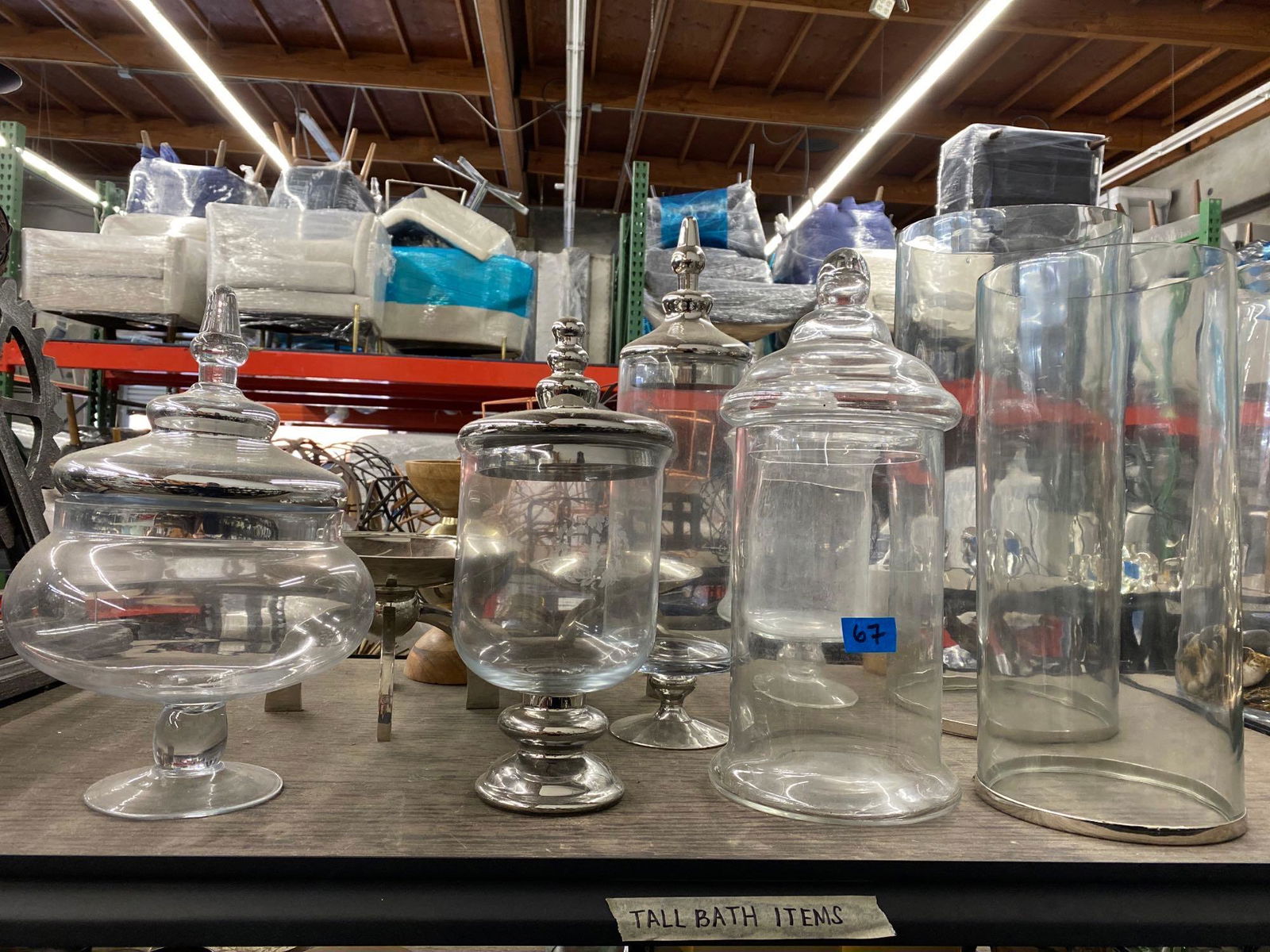 Top shelf canisters, containers, candleholders, mostly glass (1 of 2)