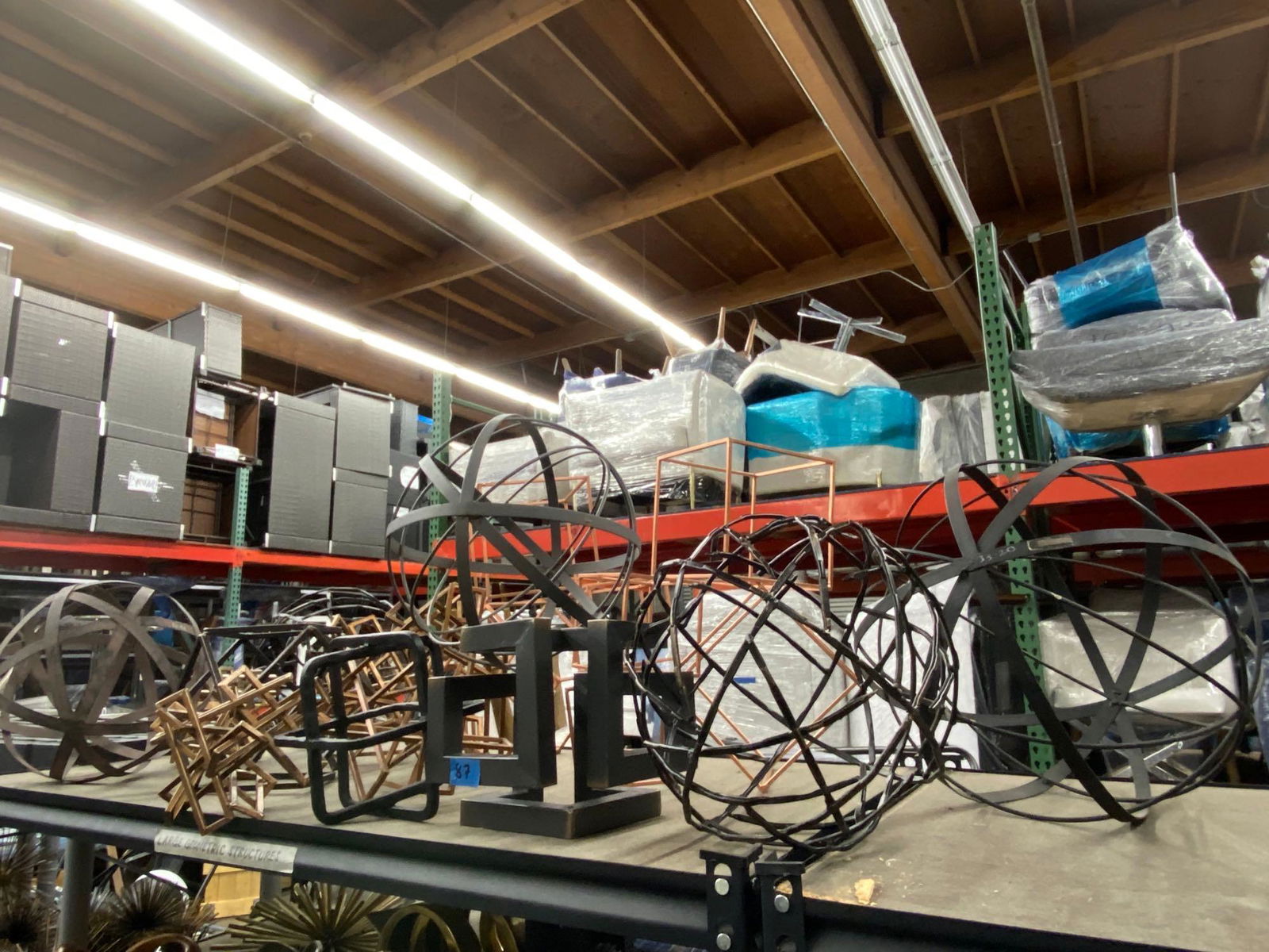 Top shelf metal decorative spheres, cubes (1 of 4)