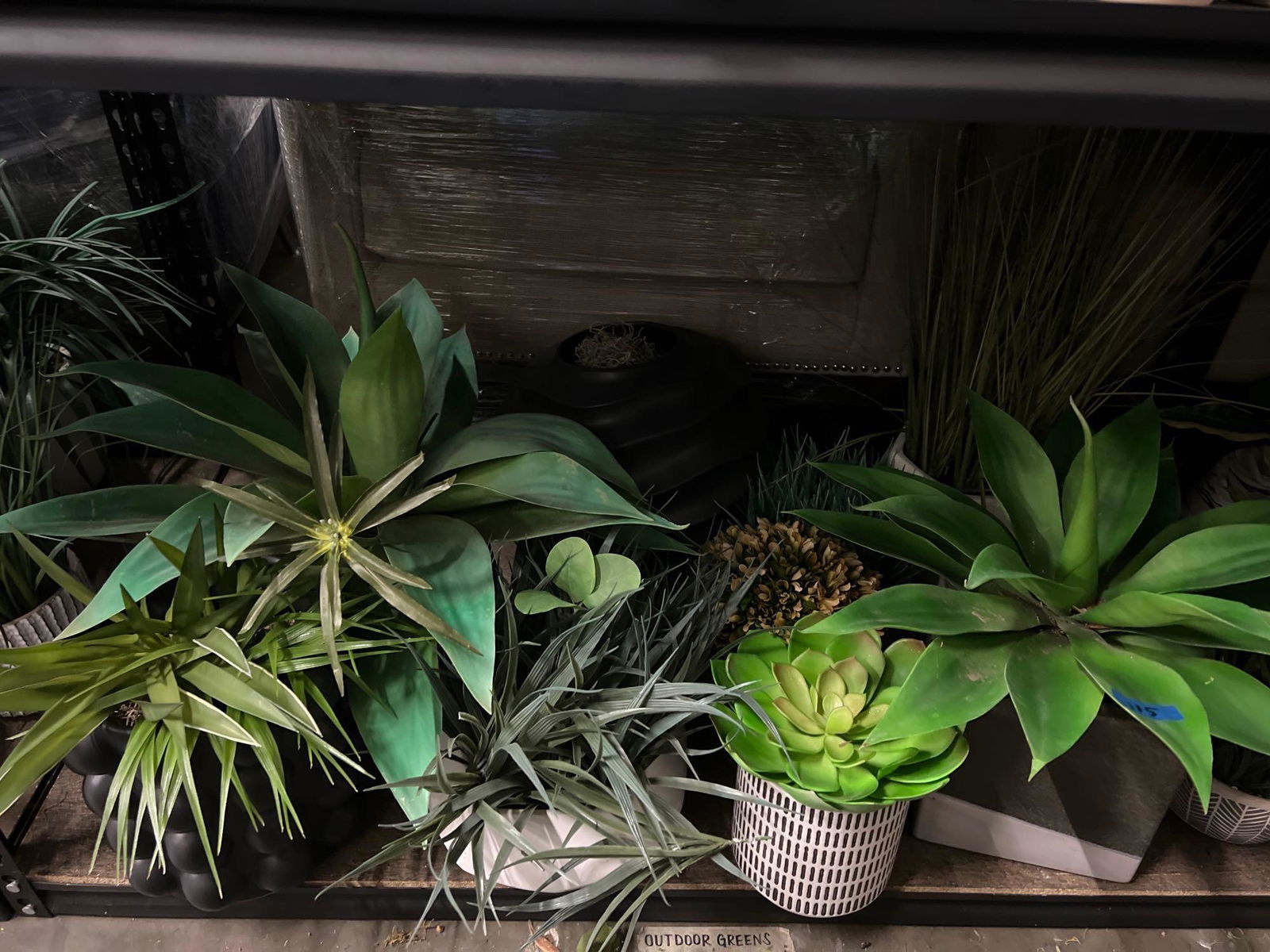 Bottom shelf planters, faux plants (1 of 5)