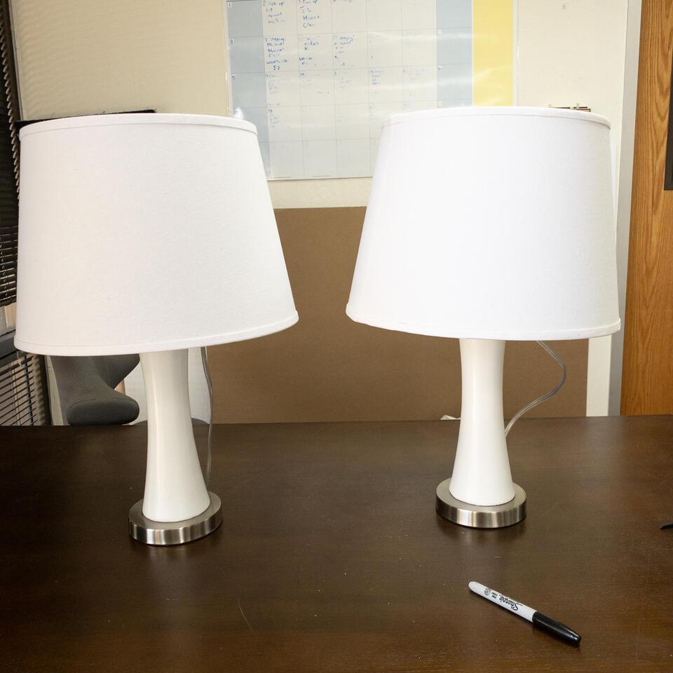 Pair ana Table Lamps: White table lamp, Jana. Base Dimensions: 17"x5" Shade Dimensions: 10"x11" NO SHIPPING AVAILABLE This will be a two (2) day sale Wed & Thur. Jan. 18th & 19th.. Online only.All items sold as is where is