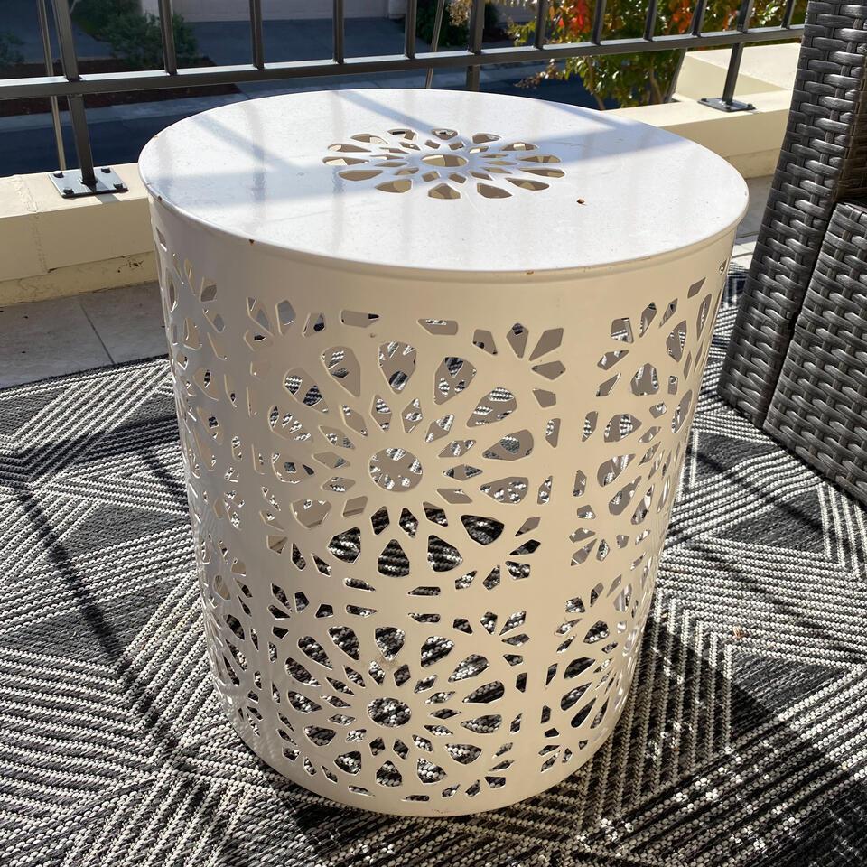 White outdoor side table. (1 of 2)