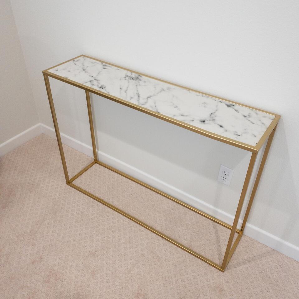 Console: Console Keyword: White marble, white, gold, metal legs NO SHIPPING AVAILABLE This will be a two (2) day sale Thursday & Friday Jan 19th & 20th. Online only.All items sold as is where is. There are No 