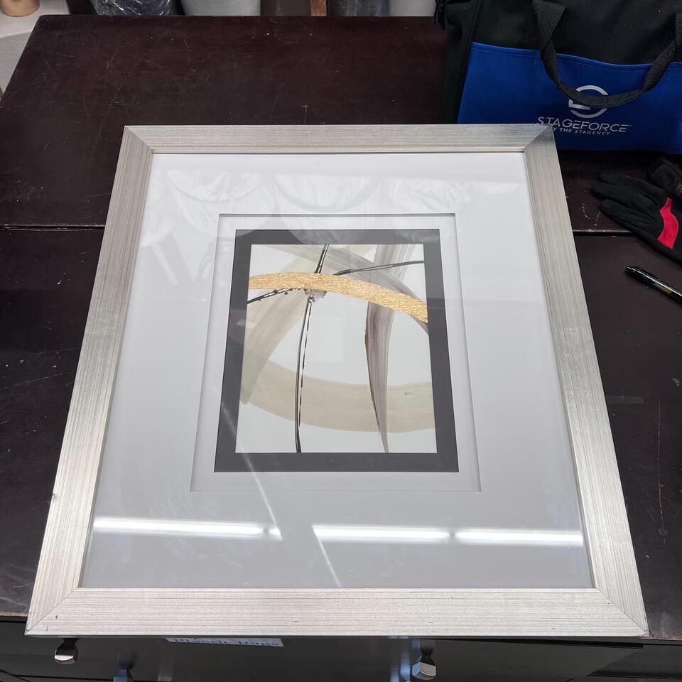 Gold And Black Abstract Art With Silver Frame: Gold and Black abstract art with silver frame 21x23 NO SHIPPING AVAILABLE This will be a two (2) day sale Thursday & Friday Jan 19th & 20th. Online only.All items sold as is where is. There are No gua