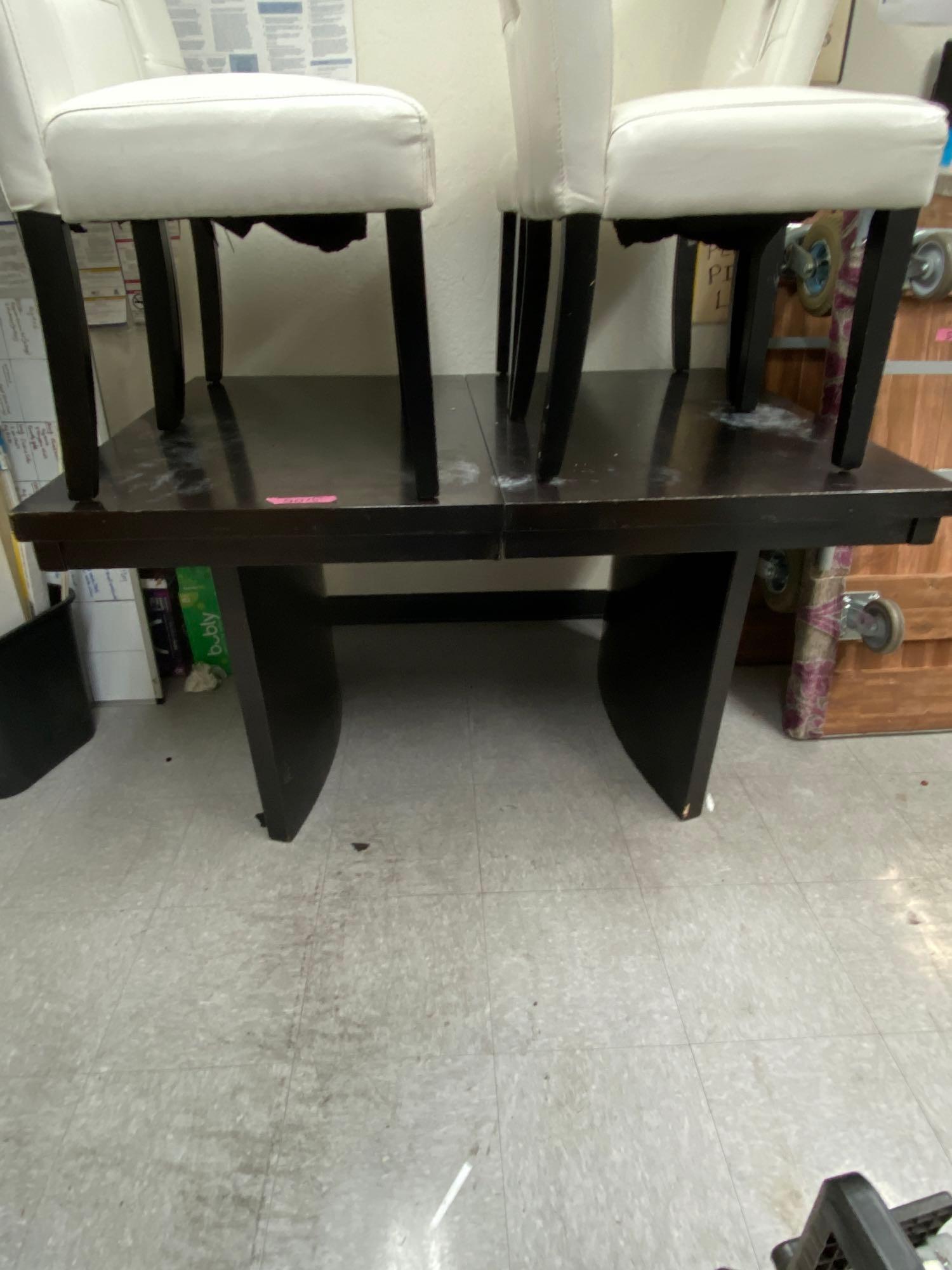 Break Room Table Set: table and 4 white chairs This will be a two (2) day sale Thursday & Friday Jan 19th & 20th. Online only.All items sold as is where is. There are No guarantees to functionality, condition, or fitness f