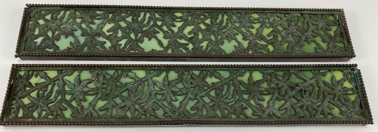 Antique Apollo Studios Bronze Art Glass Blotter Ends: Antique Apollo Studios Bronze Art Glass Blotter Ends. Marked Apollo Studios New York. Each Approximately 12.0L x 2.125W x 0.5H in.