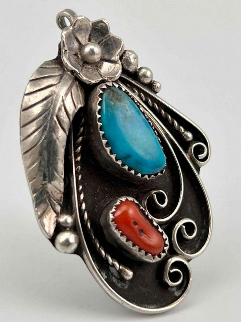 Navajo Sterling Silver Turquoise & Coral Pendant, Signed: Navajo Sterling Silver Turquoise & Coral Pendant, Signed, 12.3g. Signed D&J Clark Navajo. Tests As Sterling. Approximately 1.75L x 1.25W in.