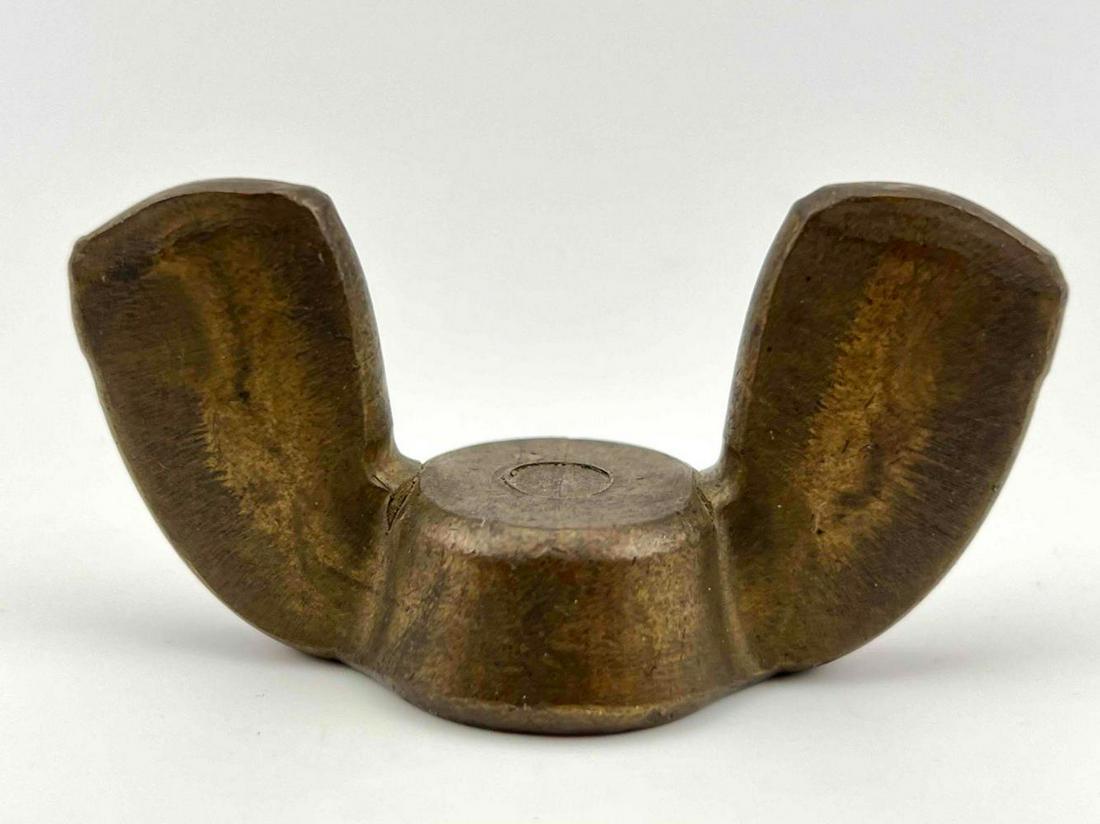 Bronze Pop Art Wing Nut Sculpture or Paperweight, Unsigned: Bronze Pop Art Wing Nut Sculpture or Paperweight, Unsigned. Approximately 2.75L x 1.375H x 1.0W in.
