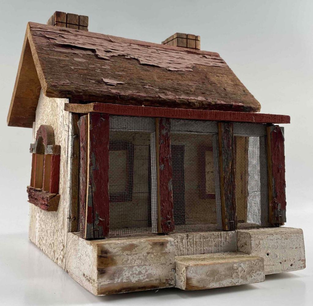 Folk Art Wooden Bird House: Folk Art Wooden Bird House. Bottom Signed: The Lake House Jim Jackson 97. Approximately 10.625H x 10.0W x 10.5D in.