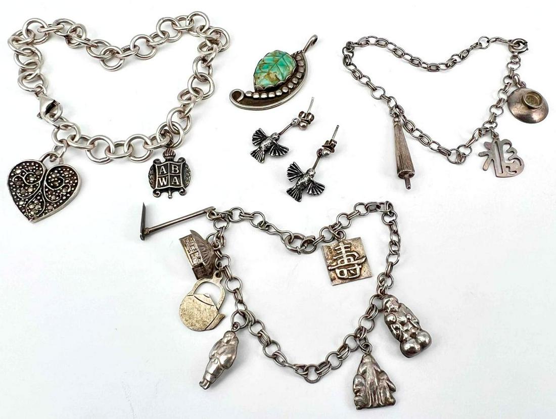 Vintage Silver Jewelry Lot, Including Charm Bracelets: Vintage Silver Jewelry Lot, Including Charm Bracelets, 45.4g. Pieces Marked Or Test As Silver. Longest Bracelet Approximately 8.5in Long. Hummingbird Earrings Approximately 0.75L x 0.5W in.