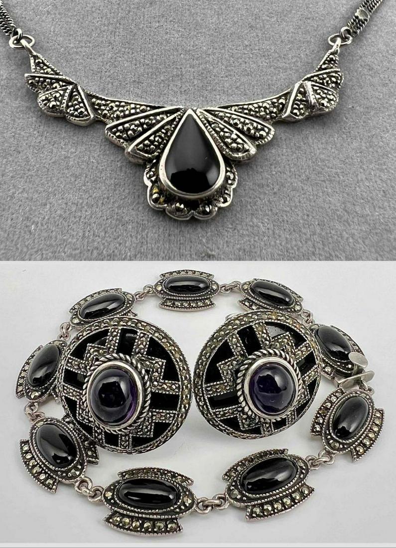 Vintage Sterling Silver Marcasite Jewelry Lot: Vintage Sterling Silver Marcasite Jewelry Lot, Including Amethyst & Onyx, 50.5g. Marked Sterling or 925. Necklace Approximately 15.5 in Long, Front Approximately 2.125L x 0.625W in. Bracelet Approxima