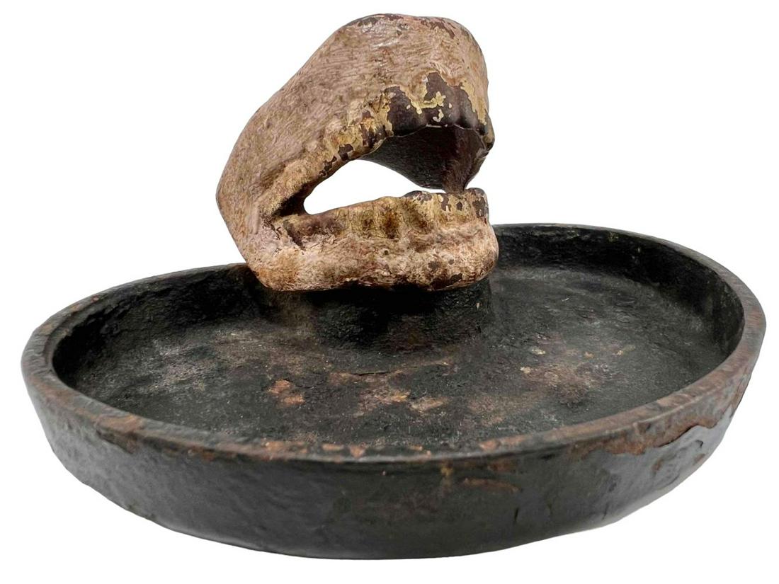 Early Wilton Cast Iron Human Teeth Bottle Opener and Tray: 1930's Early Wilton Cast Iron Human Teeth Bottle Opener and Tray. Marked "Wilton Prod." Approximately 5.5W x 3.0H x 3.625D in.