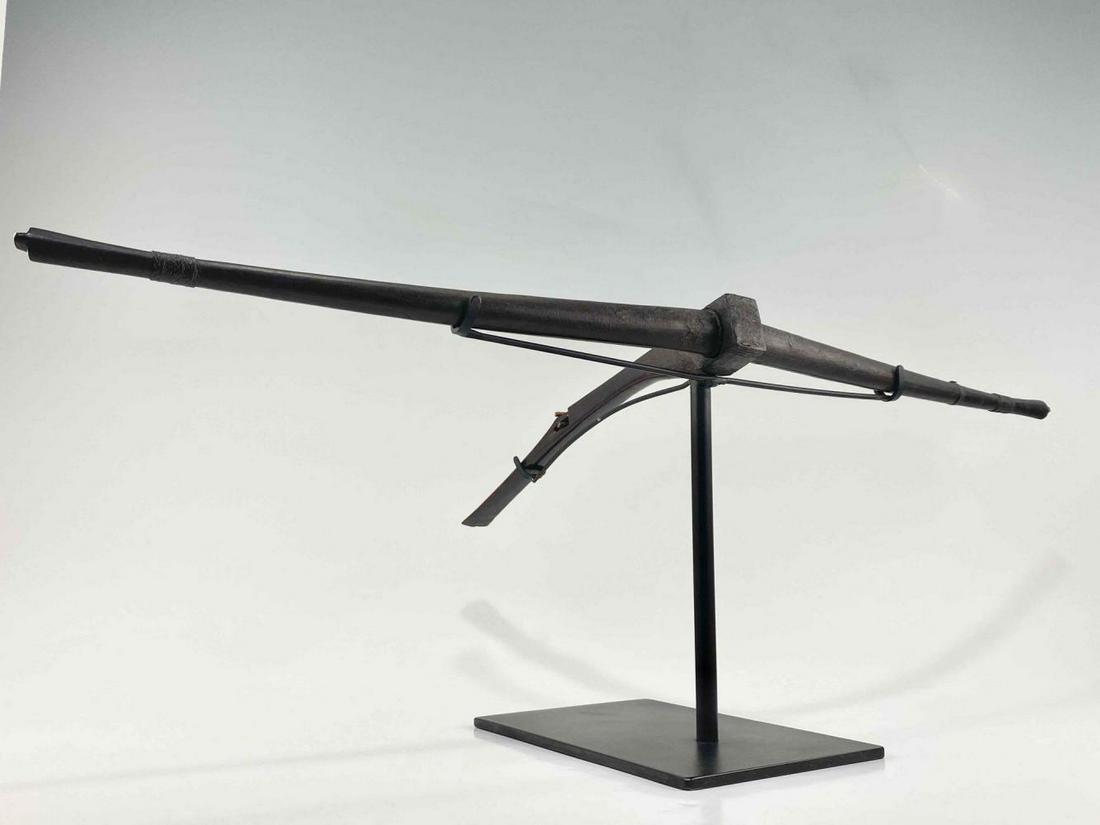Antique Moi Vietnamese Carved Wood Crossbow: Antique Moi Vietnamese Carved Wood Crossbow With Bone & Wrapped Wire Detail. Bow Approximately 30.875W x 14.125L x 1.5D in. On Stand Approximately 30.875W x 14.125L x 11.0625H in.