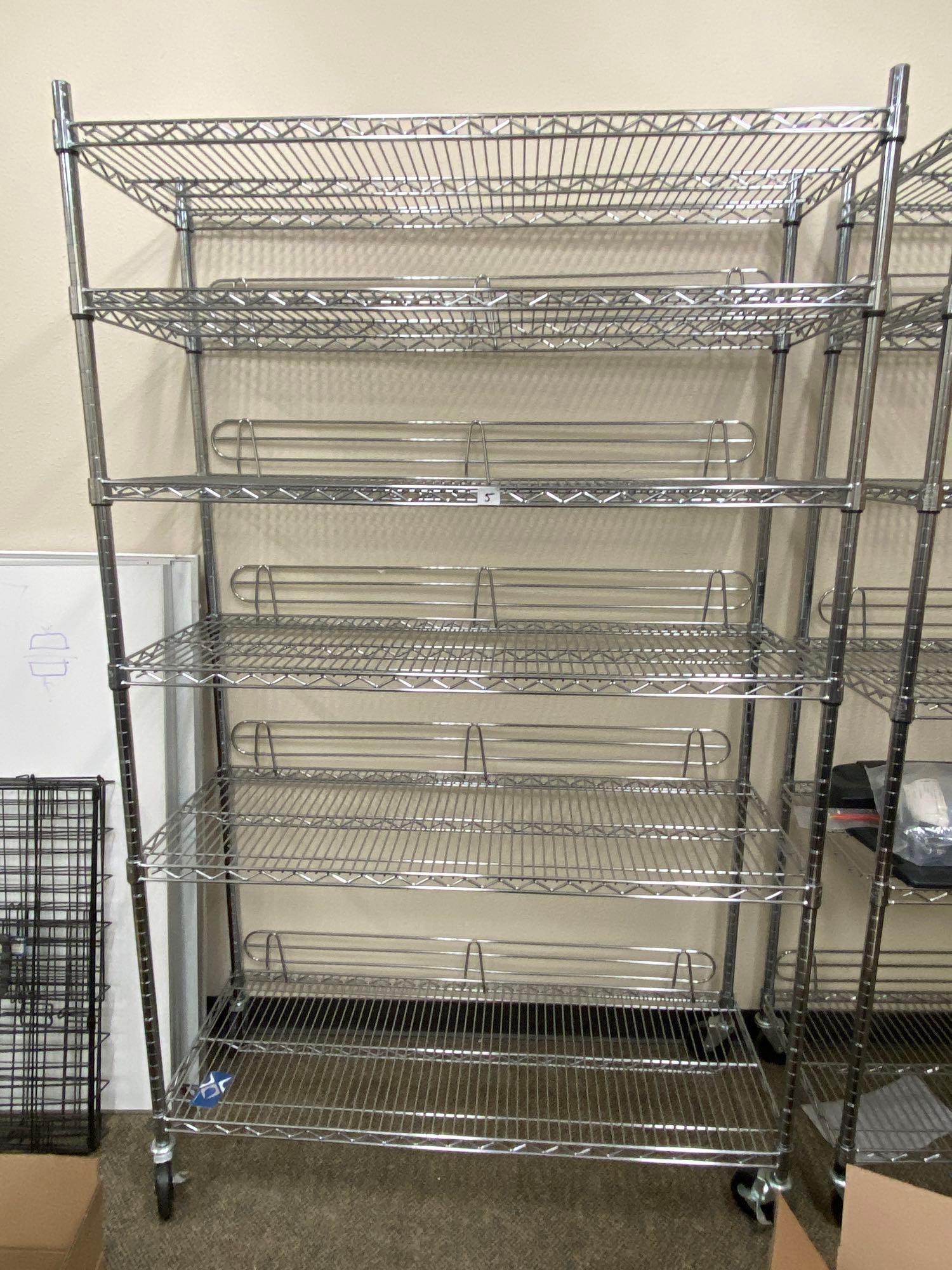 Six Tier Rolling Rack: Six tier rolling rack NO SHIPPING AVAILABLE All items sold as is where is. There are No guarantees to functionality, condition, (owner of business states that items are functional Clark's does NOT gua