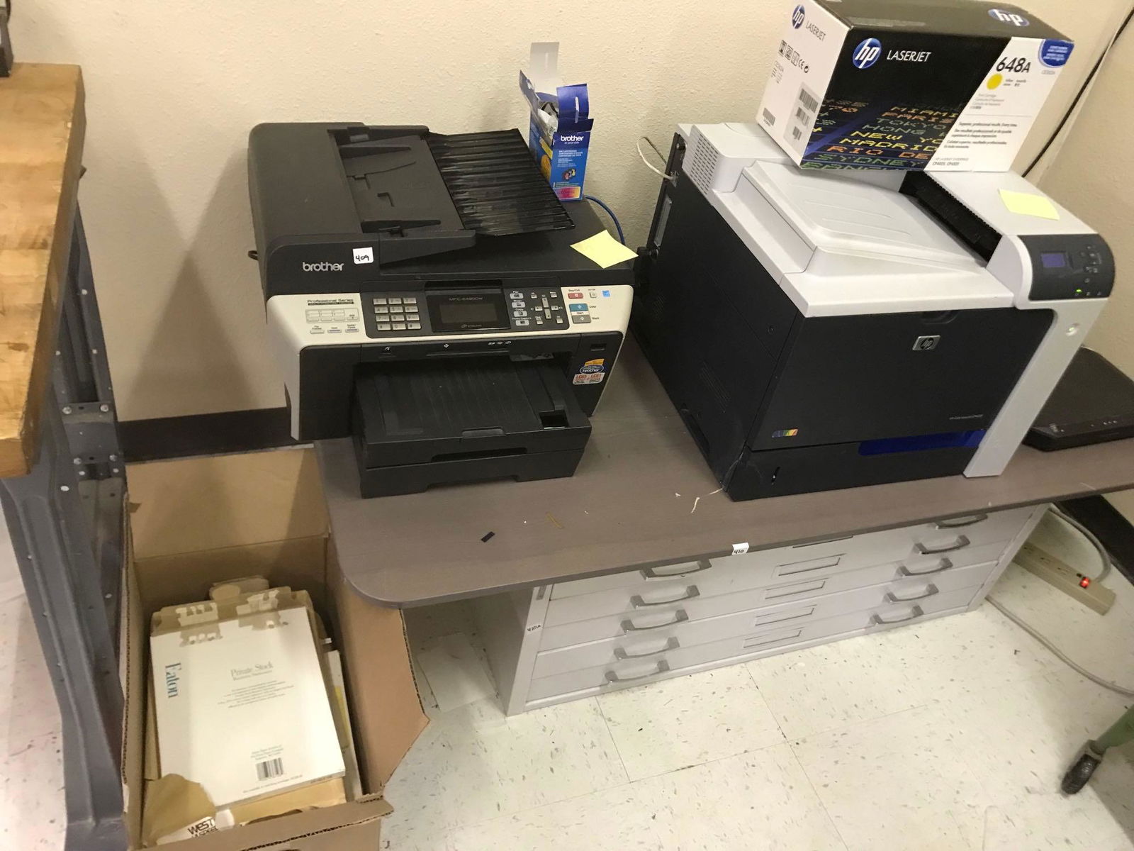 Brother And Hp Printers With Paper And Some Ink (1 of 1)