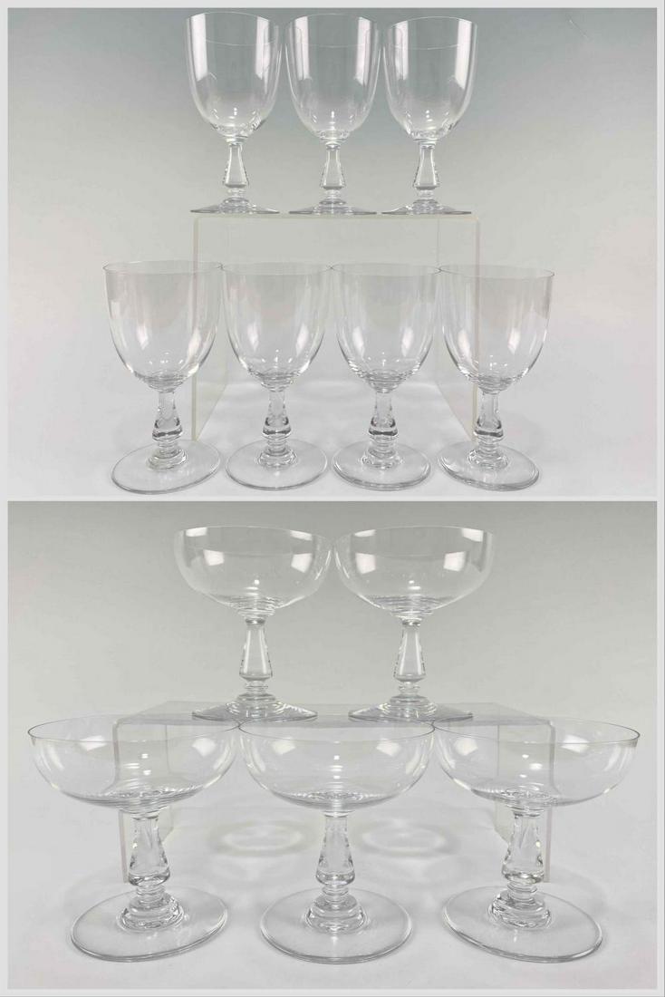 Lot of Baccarat Crystal Wine and Champagne Glasses: Baccarat Crystal Champage Glasses & White Wine Stems. 7 White Wine Stems. 5 Champagne Glasses. Marked: "Baccarat France." Each Approximately 4.0625H x 3.8125W in. White Wine Stems Approximately 6.6H x