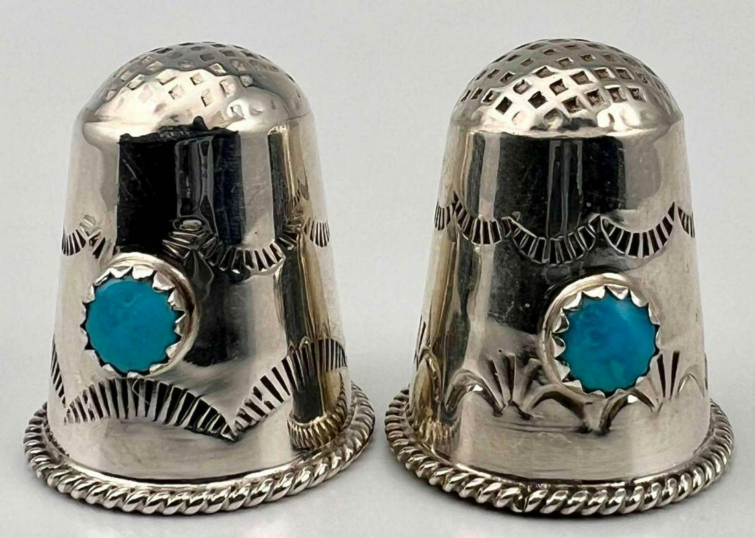 2 Navajo Sterling Silver Turquoise Hand Stamped Thimbles: 2 Navajo Sterling Silver Turquoise Hand Stamped Thimbles, Signed Jeffrey Castillo, 8.3g. Marked Sterling. Each Approximately 0.875H x 0.75W in.