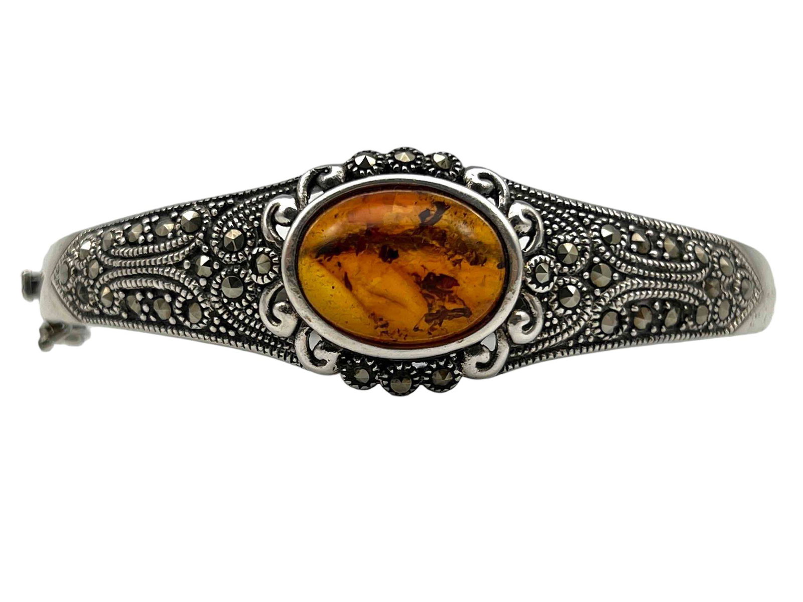 Sterling Silver, Amber, And Marcasite Bracelet.: Sterling Silver, Amber, And Marcasite Bracelet. 21.1g. Marked 925. Inner Measurement Approximately 6.75in. Max Opening 3.0in. Front 0.75W in. ALL CREDIT CARDS WILL BE MANUALLY VERIFIED PRIOR TO SHIPME