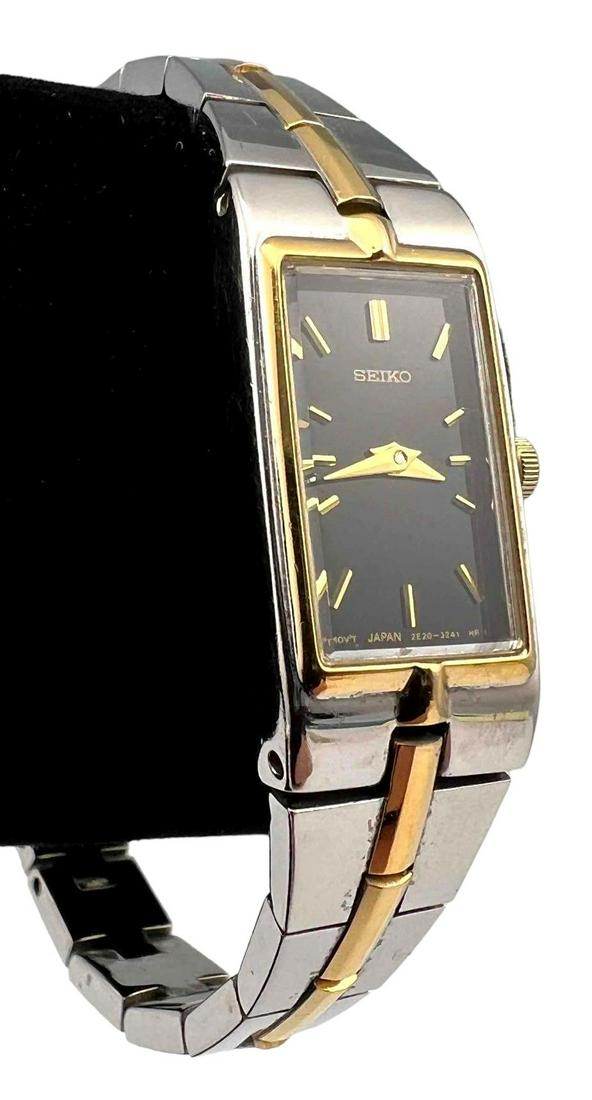 Vintage Ladies Seiko Watch: Women's Two Tone Seiko Watch. Watch Face Marked Seiko Mov't Japan 2E20-3241 HR 1. Back Marked Seiko Water Resistant 120287. Band Marked 44Y2-8-F, Seiko Base Metal. Approximately 6.375L x 0.5W in.
