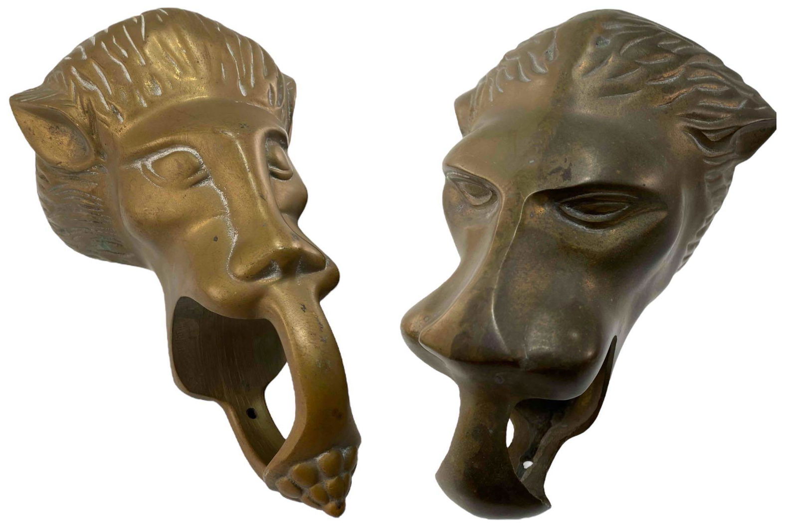 Pair of Brass Lion Head Foot Rail Or Curtain Brackets: Pair of Brass Lion Head Foot Rail or Curtain Brackets. Approximately 7.5L x 5.375W x 5.5H in. Approximately 8.5L x 5.0W x 4.5H in.