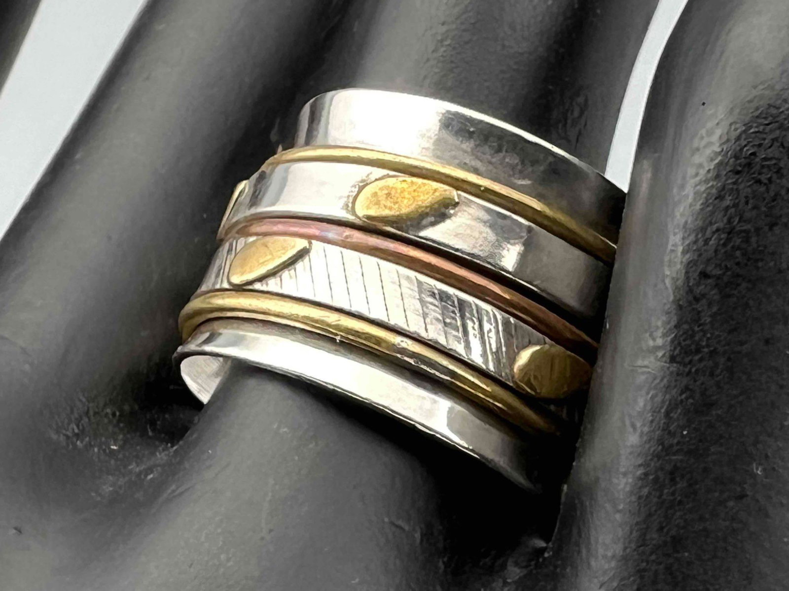 Vintage Sterling Silver Spinner Ring: Vintage Sterling Silver Spinner Ring, 11.9g. Marked 925. Approximately 0.625 in. Wide. Approximate Ring Size 8.