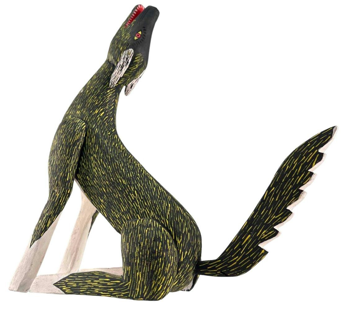 Mexican Hand Painted Wood Coyote Figure: Mexican Hand Painted Wood Coyote Figure, Signed Juventino Melchor. Approximately 8.5H x 7.75L x 2.25W in.