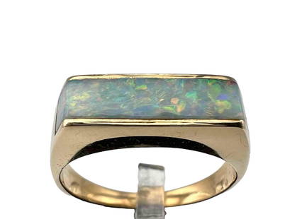 14K Modernist Opal Ring: 14K Modernist Opal Ring, 5.2g. Marked 14K. Opal Approximately 0.625L x 0.1875W in. Approximate Ring Size 7. ALL CREDIT CARDS WILL BE MANUALLY VERIFIED PRIOR TO SHIPMENT.