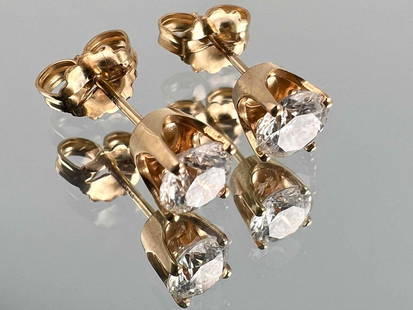 14K Diamond Solitaire Post Earrings: 14K Diamond Solitaire Post Earrings, 0.9g. Marked 14K. Diamonds 4.5mm. All measurements are approximate. ALL CREDIT CARDS WILL BE MANUALLY VERIFIED PRIOR TO SHIPMENT.