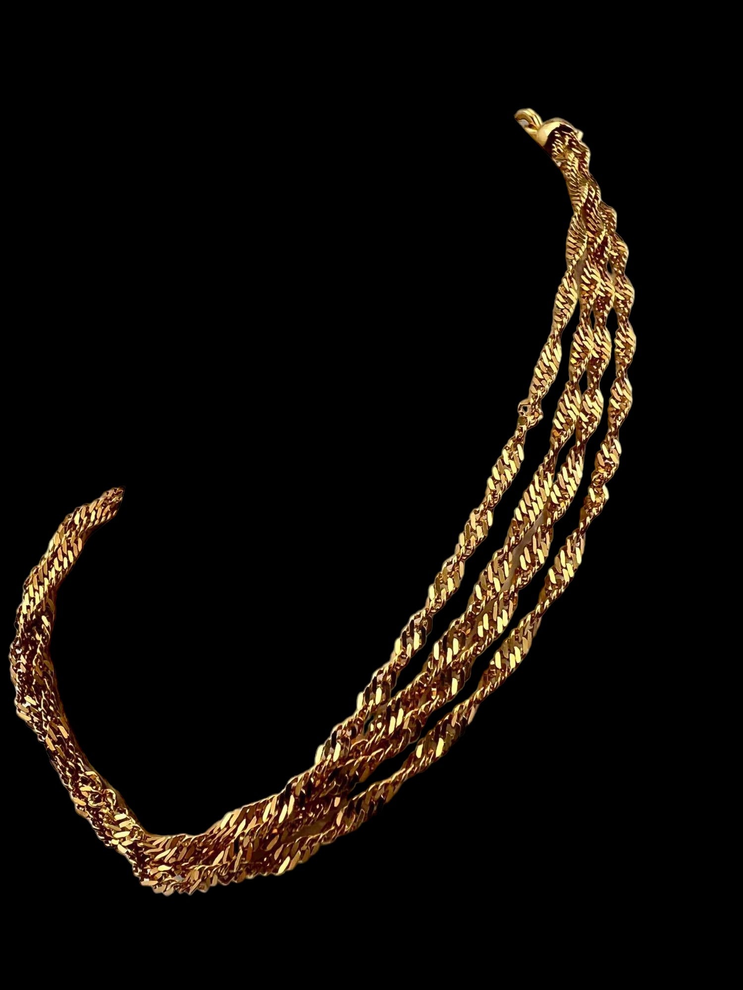 14K Four Strand Bracelet: 14K Four Strand Bracelet, 4.4g. Marked 14KT Italy, Milor. Approximately 8.125in Long. ALL CREDIT CARDS WILL BE MANUALLY VERIFIED PRIOR TO SHIPMENT.