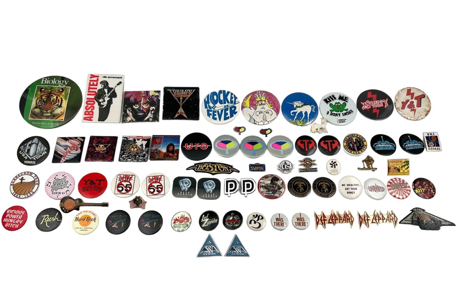 1980's Rock Band & Pop Culture Buttons: 1980's Rock Band & Pop Culture Buttons. Includes Led Zeppelin, Kiss, Aerosmith, Scorpions, Def Leppard, and more. Largest 3.5L x 3.5W in. Smallest 0.75L x 0.5W in.