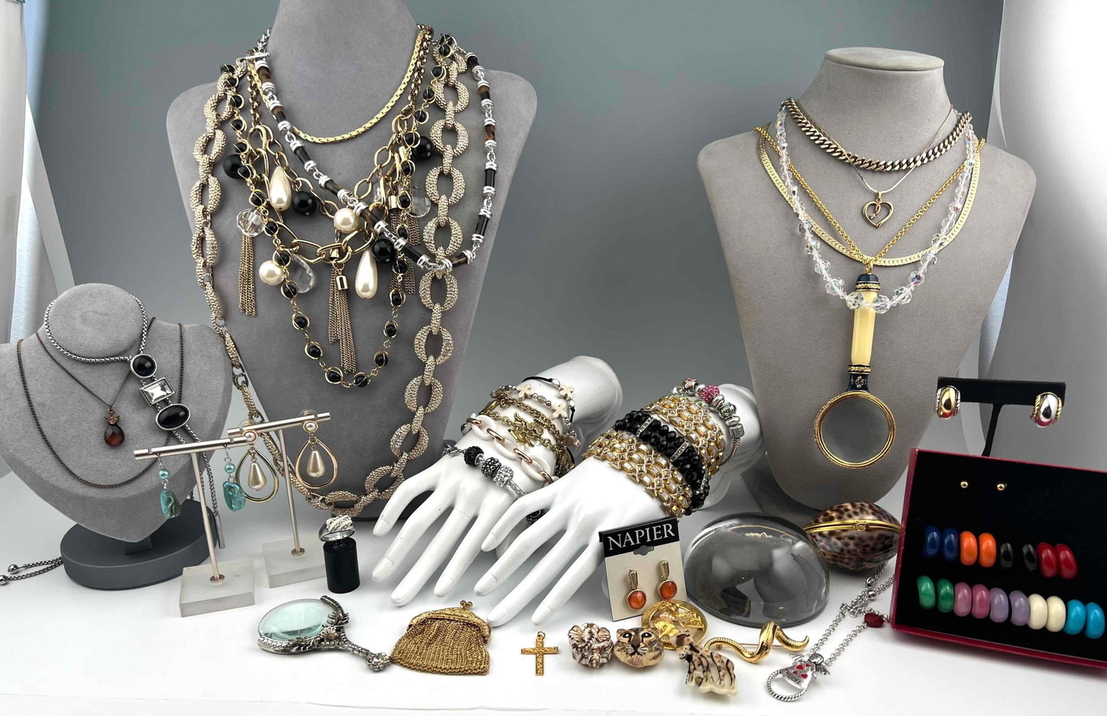 Costume Jewelry & Collectibles: Costume Jewelry & Collectibles. Includes necklaces, bracelets, earrings, rings, magnifying glasses, paperweight, Pendants, and button covers. Largest Piece (Paperweight in box) 4.0W x 2.125H in. Small