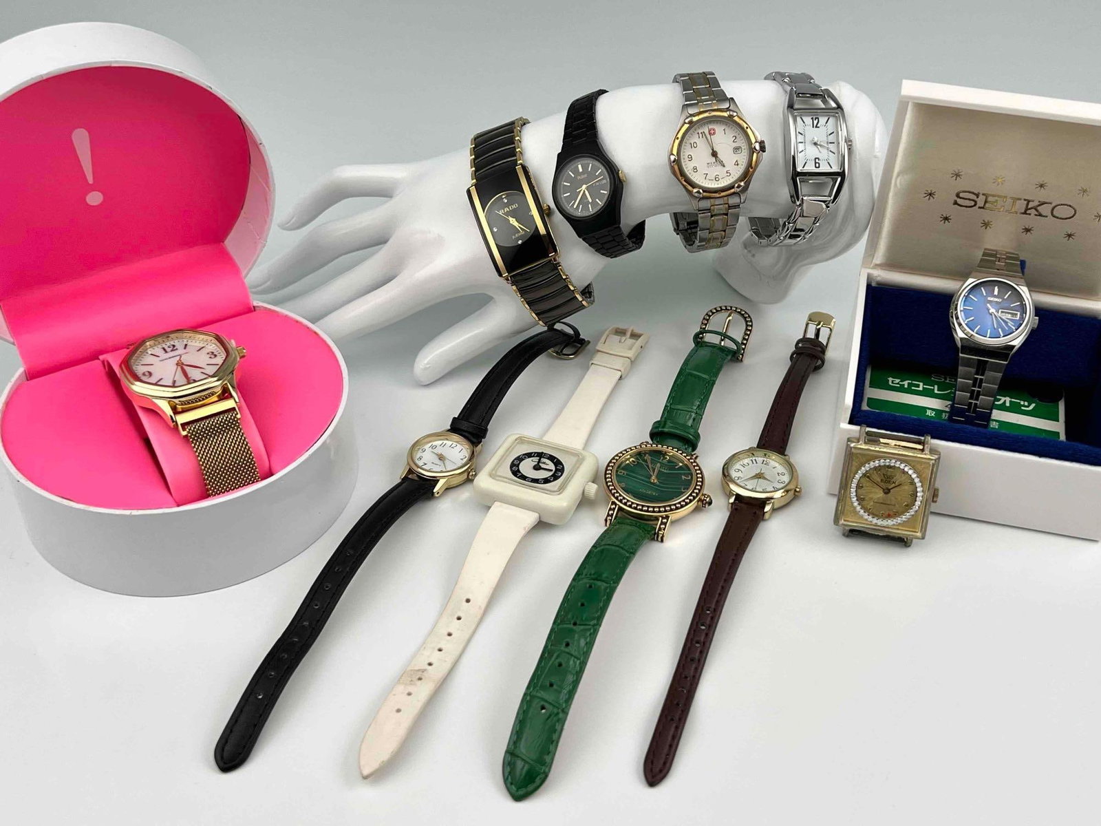 Ladies Watches Including Vintage Seiko: Ladies Watches Including Vintage Seiko. Unknown running condition. Largest piece (Isaac Mizrahi Live watch in box) 4.0L x 4.25W x 2.375D in. Smallest (mid century Eden watch) 1.5L x 1.1875W in.