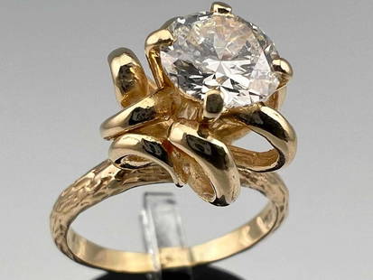 14K 1.44ct Diamond Solitaire Ring: 14K Diamond Solitaire Ring, 5.5g. Marked 14K. Diamond 1.44ct, Color: I, Clarity: SI1. Approximately 7.23mm. Approximate Ring Size 7.5. Appraisal Value $9,980.00. ALL CREDIT CARDS WILL BE MANUALLY