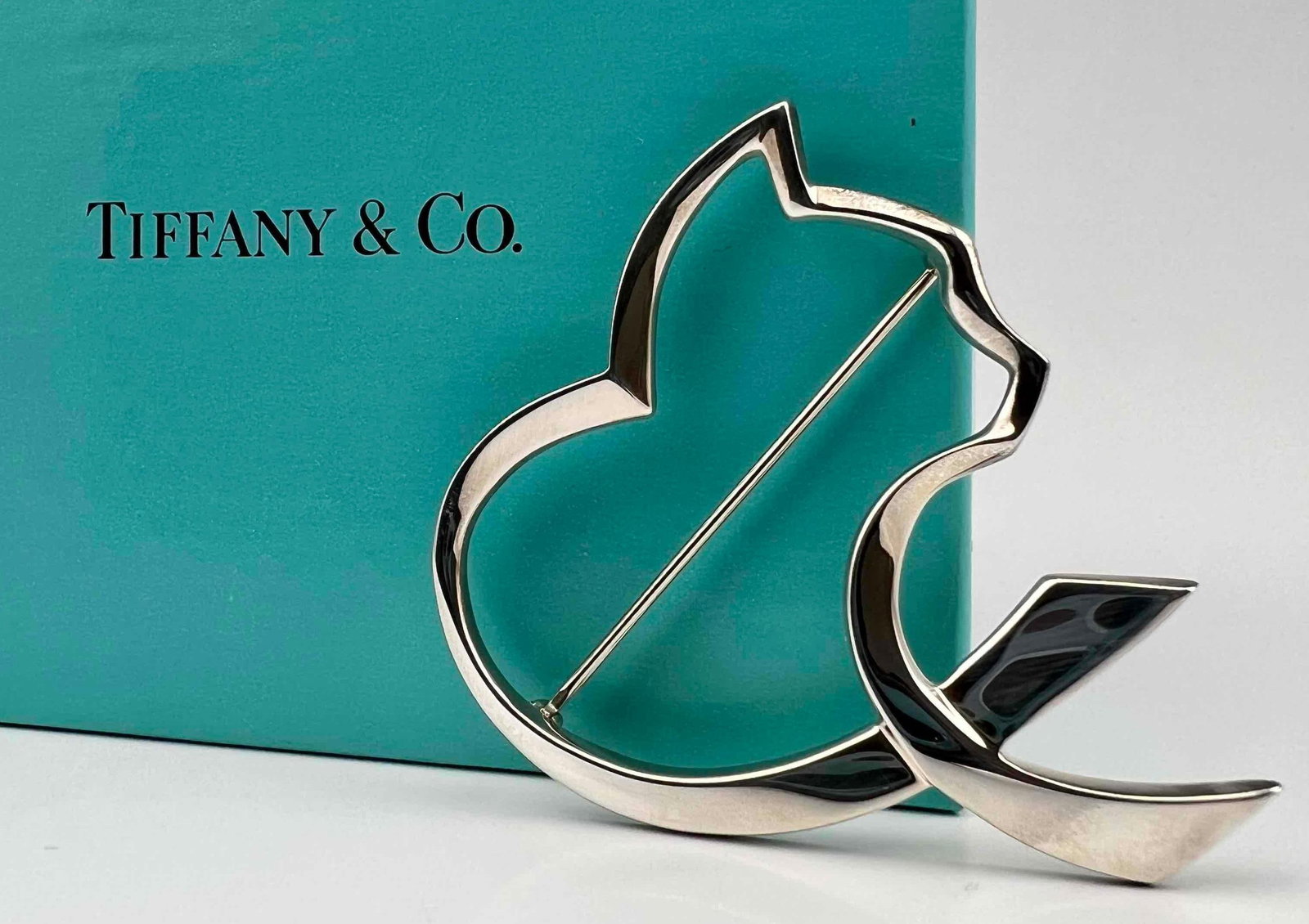 Sterling Silver Tiffany & Co. Paloma Picasso Cat Brooch: Sterling Silver Tiffany & Co. Paloma Picasso Cat Brooch, 8.9g. Marked "Tiffany & Co. 925 Paloma Picasso." Includes original box. Approximately 2.0H x 1.75W in.