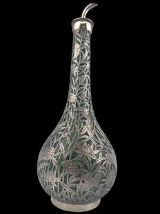 Fine Sterling Overlay Cruet, Lotus Flower and Bud Design: Fine Sterling Silver Overlay Cruet Bottle, Featuring Detailed Lotus Flower and Bud Design, in the Manner of Yuan Shun and other Chinese Export Makers. Marked Sterling, Unknown Makers Mark. Approximate