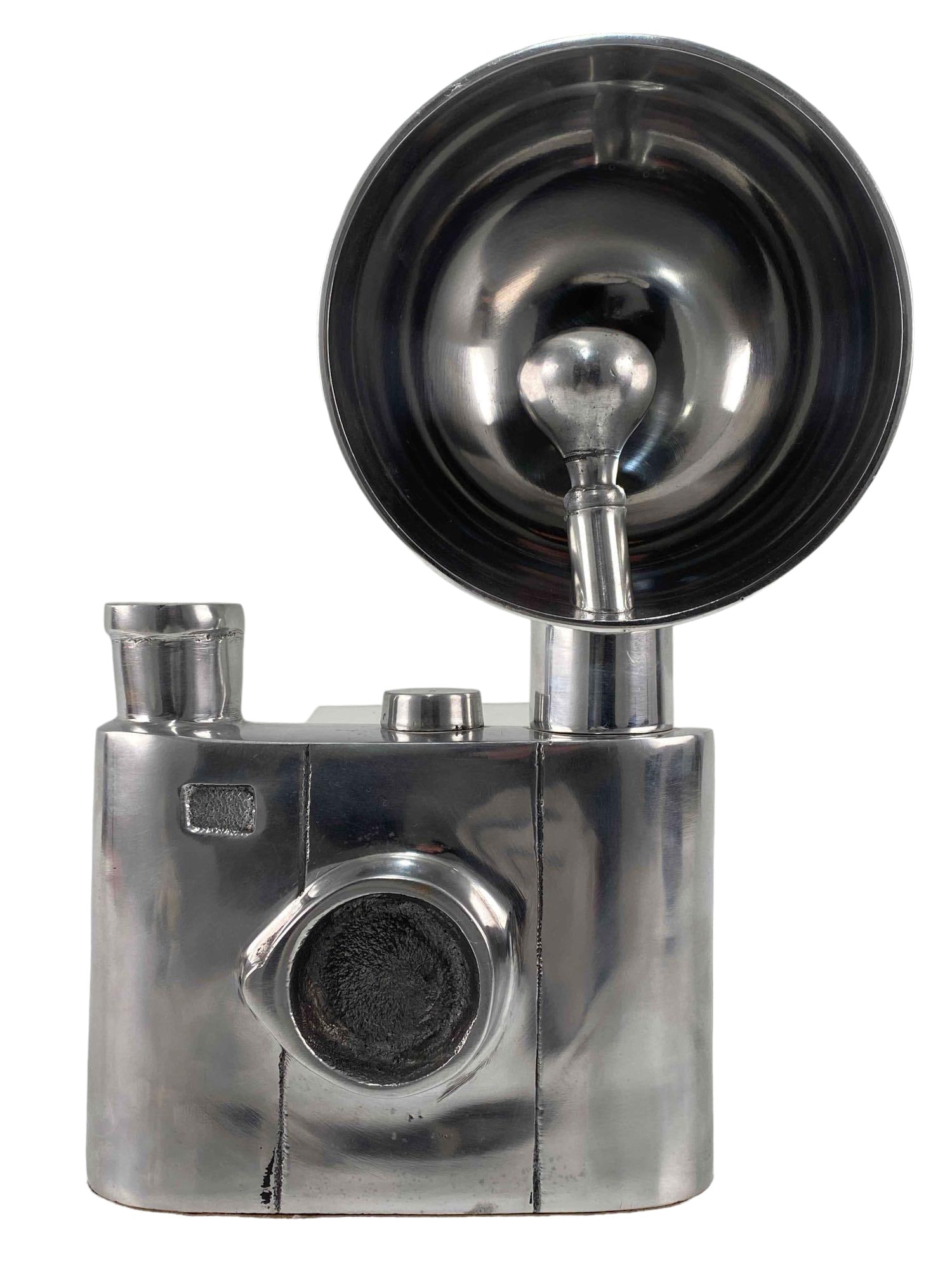 Unusual Aluminum Modernist Sculpture of a Film Camera: An unusual modernist polished aluminum sculpture of an early film camera with flash, unsigned, unknown maker. Excellent decorator or designer modern sculpture. 11.25H x 7.75W x 3.0D in. All measuremen